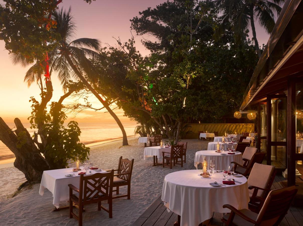 Royal Island Resort Maldives Dharavandhoo Exterior photo Sunset at the Beach Bar